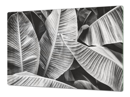Gigantic Worktop saver and Pastry Board - Tempered GLASS Cutting Board - MEASURES: SINGLE: 80 x 52 cm; DOUBLE: 40 x 52 cm; DD44 Nature series : Black and white banana leaves
