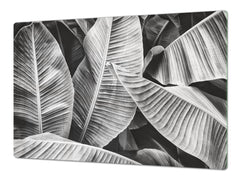 Gigantic Worktop saver and Pastry Board - Tempered GLASS Cutting Board - MEASURES: SINGLE: 80 x 52 cm; DOUBLE: 40 x 52 cm; DD44 Nature series : Black and white banana leaves