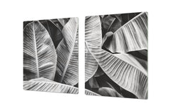 Gigantic Worktop saver and Pastry Board - Tempered GLASS Cutting Board - MEASURES: SINGLE: 80 x 52 cm; DOUBLE: 40 x 52 cm; DD44 Nature series : Black and white banana leaves