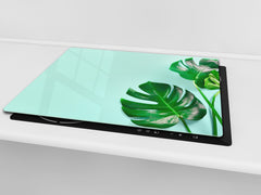 Induction Cooktop Cover Kitchen Board – Impact Resistant Glass Pastry Board – Heat resistant; MEASURES: SINGLE: 60 x 52 cm (23,62” x 20,47”); DOUBLE: 30 x 52 cm (11,81” x 20,47”); D31 Tropical Leaves Series: Monstera summer leaves