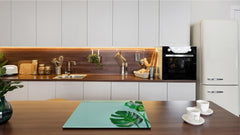 Induction Cooktop Cover Kitchen Board – Impact Resistant Glass Pastry Board – Heat resistant; MEASURES: SINGLE: 60 x 52 cm (23,62” x 20,47”); DOUBLE: 30 x 52 cm (11,81” x 20,47”); D31 Tropical Leaves Series: Monstera summer leaves