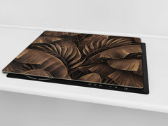 Induction Cooktop Cover Kitchen Board – Impact Resistant Glass Pastry Board – Heat resistant; MEASURES: SINGLE: 60 x 52 cm (23,62” x 20,47”); DOUBLE: 30 x 52 cm (11,81” x 20,47”); D31 Tropical Leaves Series: Bronze banana leaves