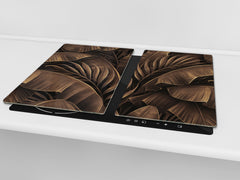 Induction Cooktop Cover Kitchen Board – Impact Resistant Glass Pastry Board – Heat resistant; MEASURES: SINGLE: 60 x 52 cm (23,62” x 20,47”); DOUBLE: 30 x 52 cm (11,81” x 20,47”); D31 Tropical Leaves Series: Bronze banana leaves