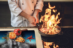Worktop saver and Pastry Board – Cooktop saver; Series: Outside Series DD19 A woman in the branches of trees