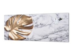 Stunning glass wall art - Wide format kitchen backsplash with and without metal back-coating - Tropical Leaves Series: Golden leaf on marble