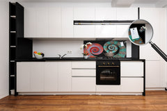 Glass kitchen panel with and w/o stainless steel back-coating: Chameleon tails