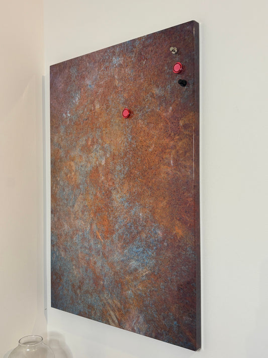 magnetic metal board displayed on a beige wall