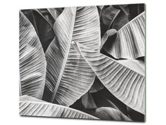 Tempered GLASS Cutting Board – Worktop saver and Pastry Board –- Glass Kitchen Board; MEASURES: SINGLE: 60 x 52 cm (23,62” x 20,47”); DOUBLE: 30 x 52 cm (11,81” x 20,47”); D34 Nature Series: Black and white banana leaves