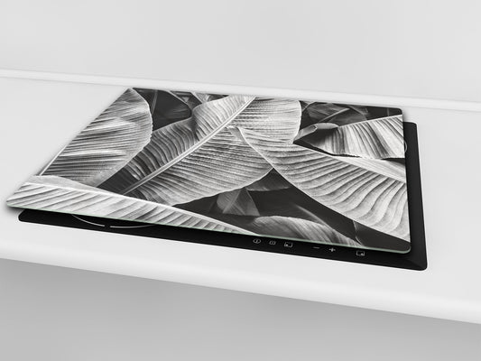 Tempered GLASS Cutting Board – Worktop saver and Pastry Board –- Glass Kitchen Board; MEASURES: SINGLE: 60 x 52 cm (23,62” x 20,47”); DOUBLE: 30 x 52 cm (11,81” x 20,47”); D34 Nature Series: Black and white banana leaves