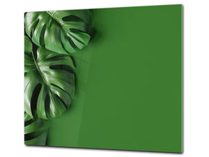 Induction Cooktop Cover Kitchen Board – Impact Resistant Glass Pastry Board – Heat resistant; MEASURES: SINGLE: 60 x 52 cm (23,62” x 20,47”); DOUBLE: 30 x 52 cm (11,81” x 20,47”); D31 Tropical Leaves Series: Green monstera deliciosa