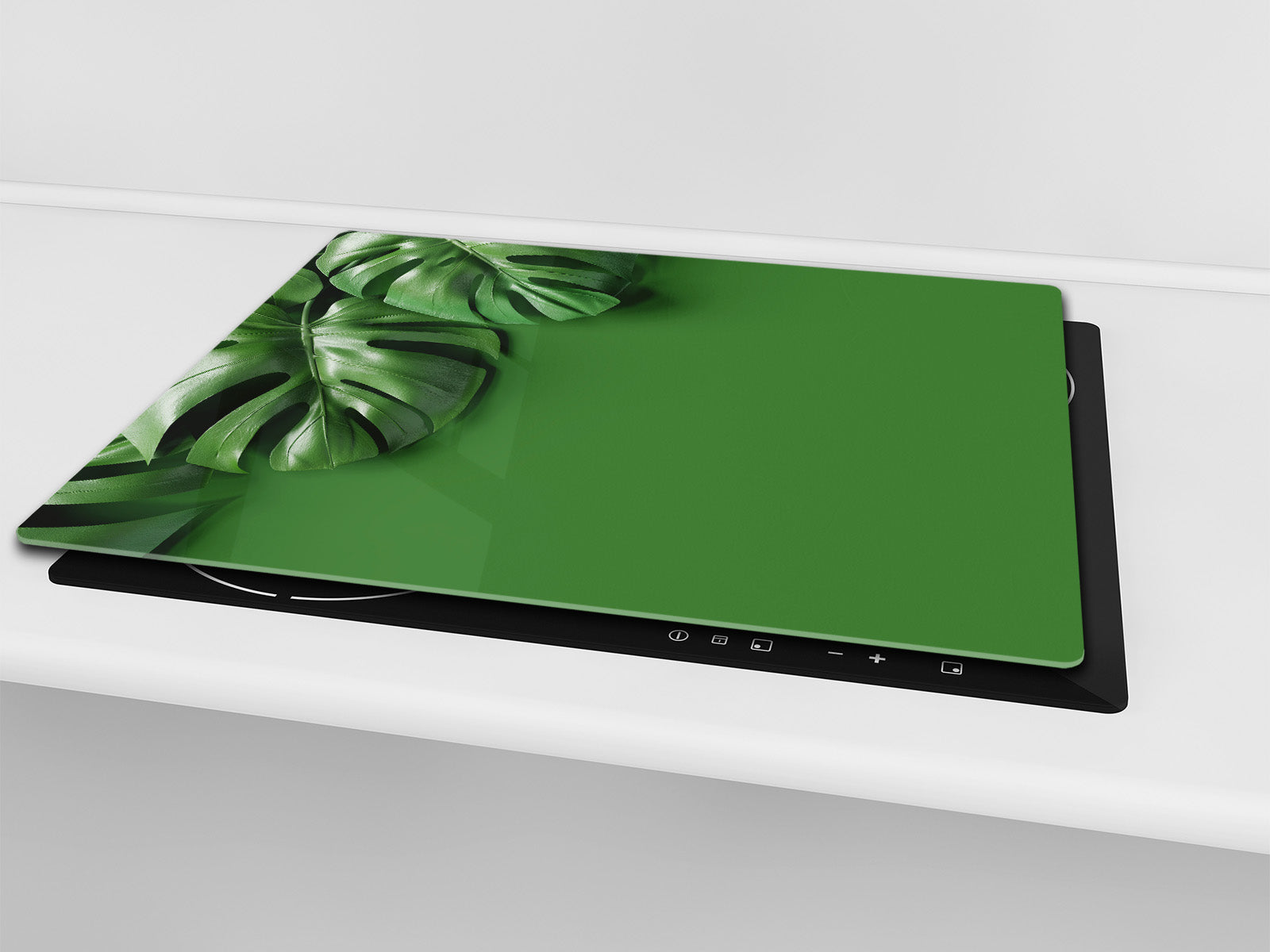 Induction Cooktop Cover Kitchen Board – Impact Resistant Glass Pastry Board – Heat resistant; MEASURES: SINGLE: 60 x 52 cm (23,62” x 20,47”); DOUBLE: 30 x 52 cm (11,81” x 20,47”); D31 Tropical Leaves Series: Green monstera deliciosa
