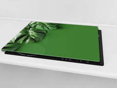Induction Cooktop Cover Kitchen Board – Impact Resistant Glass Pastry Board – Heat resistant; MEASURES: SINGLE: 60 x 52 cm (23,62” x 20,47”); DOUBLE: 30 x 52 cm (11,81” x 20,47”); D31 Tropical Leaves Series: Green monstera deliciosa