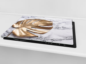Induction Cooktop Cover Kitchen Board – Impact Resistant Glass Pastry Board – Heat resistant; MEASURES: SINGLE: 60 x 52 cm (23,62” x 20,47”); DOUBLE: 30 x 52 cm (11,81” x 20,47”); D31 Tropical Leaves Series: Golden leaf on marble