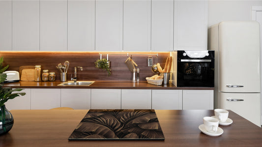 Induction Cooktop Cover Kitchen Board – Impact Resistant Glass Pastry Board – Heat resistant; MEASURES: SINGLE: 60 x 52 cm (23,62” x 20,47”); DOUBLE: 30 x 52 cm (11,81” x 20,47”); D31 Tropical Leaves Series: Bronze banana leaves
