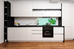 Stunning glass wall art - Wide format kitchen backsplash with and without metal back-coating - Tropical Leaves Series: Monstera summer leaves