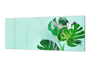 Stunning glass wall art - Wide format kitchen backsplash with and without metal back-coating - Tropical Leaves Series: Monstera summer leaves